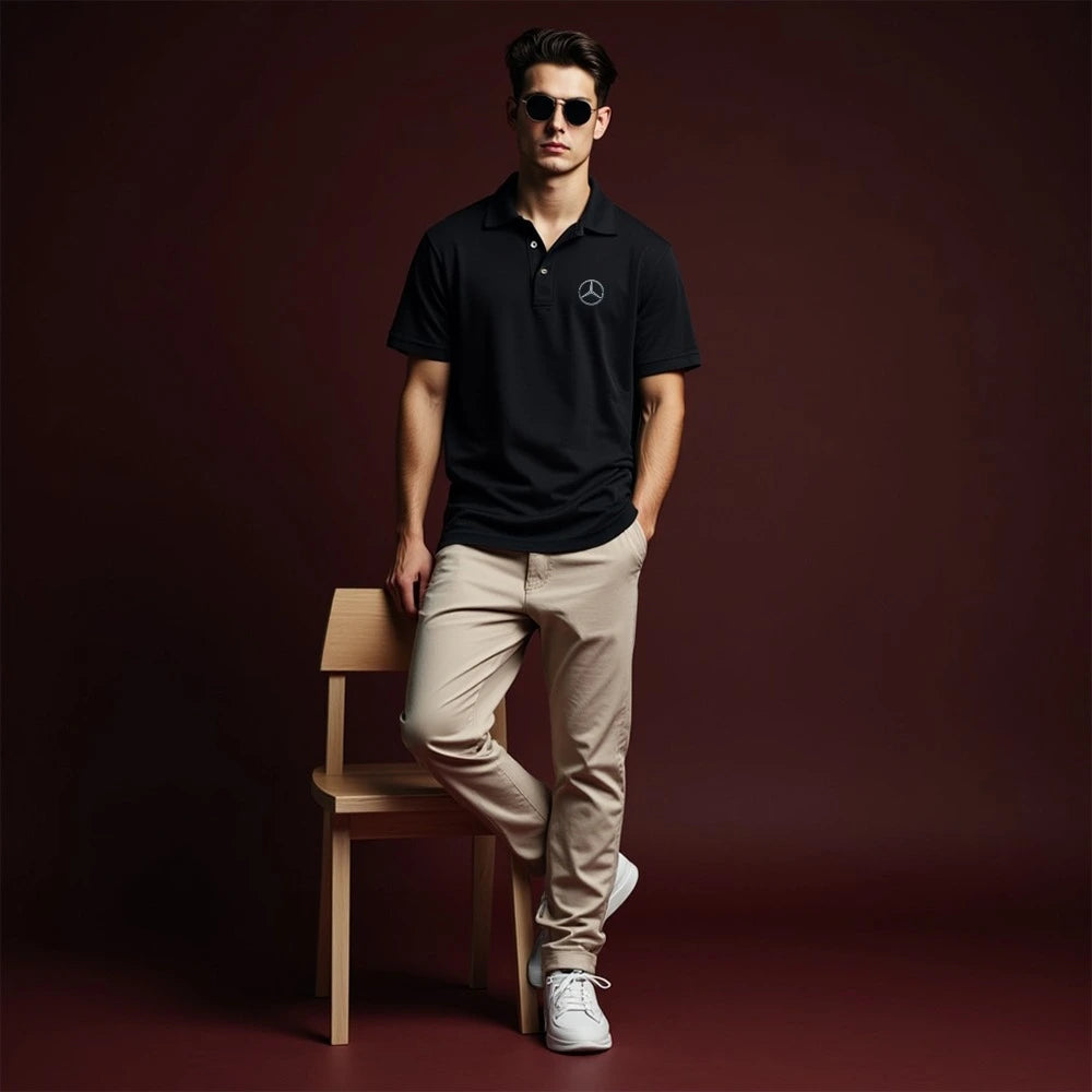 man wearing a polo shirt of cosmo attire its a black polo shirt