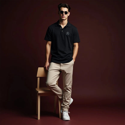 man wearing a polo shirt of cosmo attire its a black polo shirt