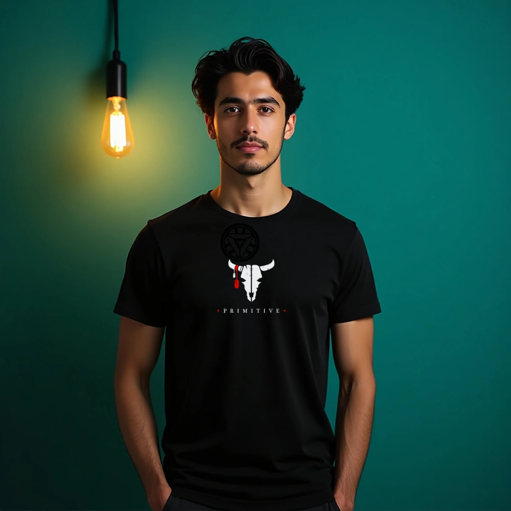 Man wearing a black t-shirt with a logo against a teal background